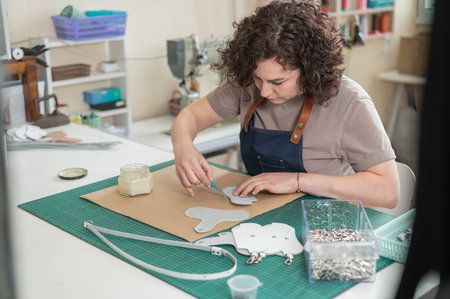 Woman tanner at work in the workshop