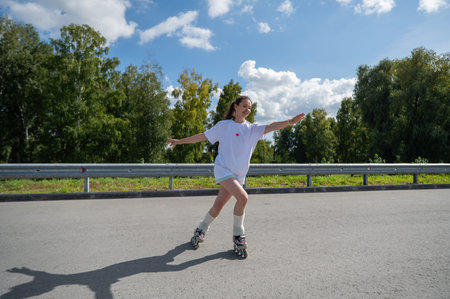 Caucasian woman rollerblading fast on road