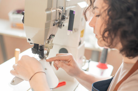 Woman tanner at work in the workshopの写真素材