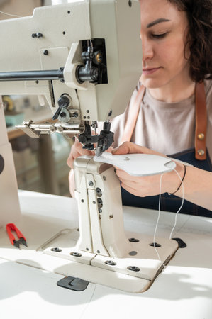Woman tanner at work in the workshopの写真素材