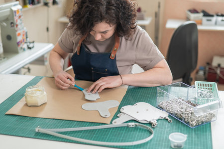 Woman tanner at work in the workshop