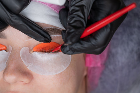Caucasian woman undergoing eyelash lamination procedureの写真素材