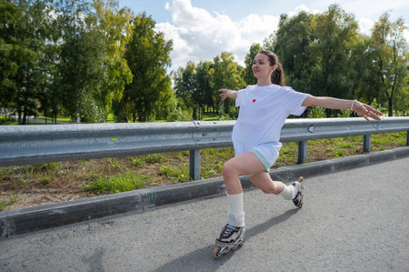 Caucasian woman in shorts roller skating