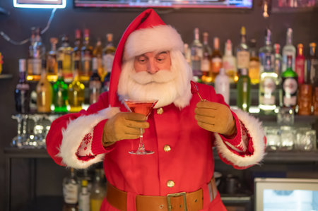 Santa Claus drinking a cocktail at a barの写真素材