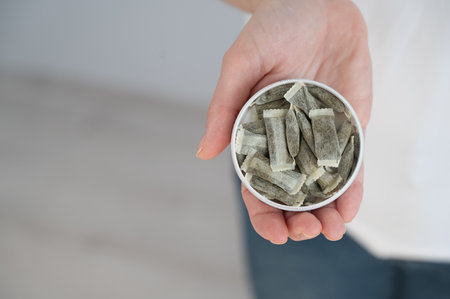 A woman holds a jarの写真素材