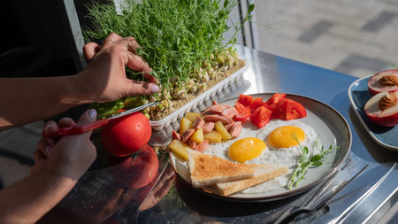 Chef serves fried eggs in a cafe