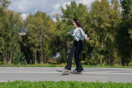 Caucasian woman roller skating in park