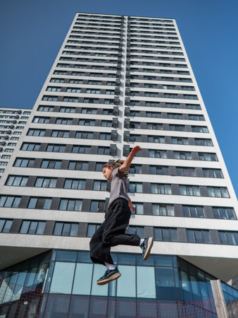 A girl jumps in the airの写真素材