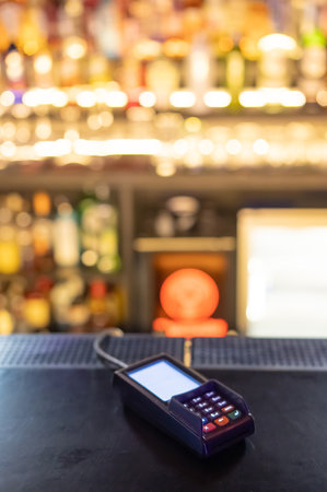 Contactless payment terminal in a pubの写真素材