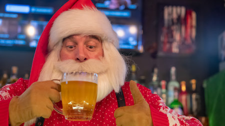 Santa Claus drinking beer at a barの写真素材