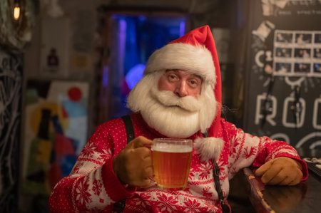 Santa Claus drinking beer at a barの写真素材