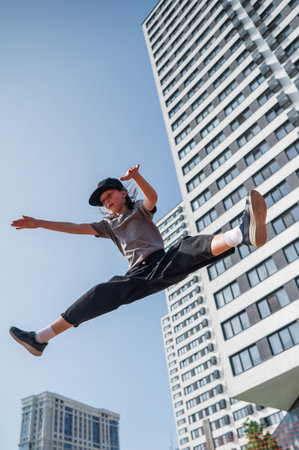 A girl jumps in the airの写真素材
