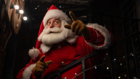 Portrait of Santa Claus in the dark with lightsの写真素材