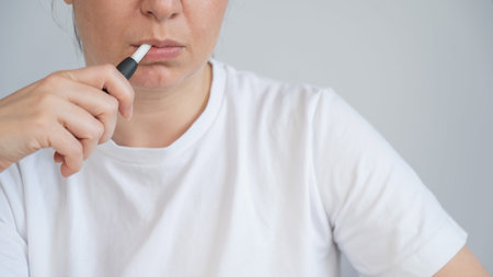Woman using an electronic device.