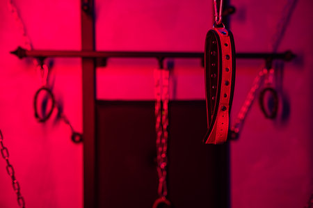 Installation. Wall with chains and handcuffsの写真素材