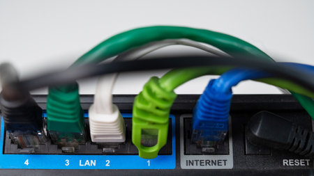 Colorful Ethernet Cables Connected to a Routerの写真素材