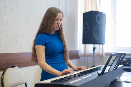 woman playing electric piano