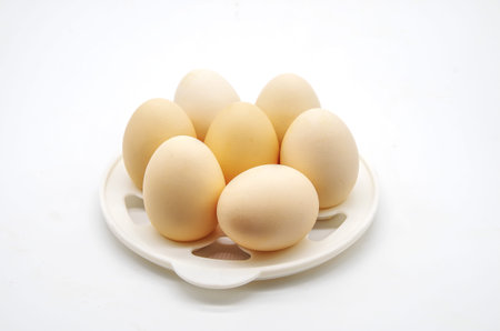 Farm eggs on a white background