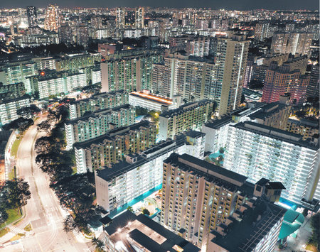 One side of a blue apartment flat with the block's number being written on its wall is facing the...