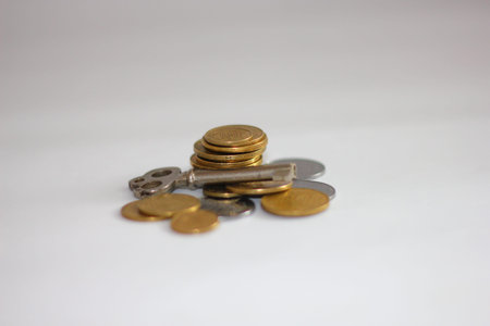 coins and old keyの写真素材