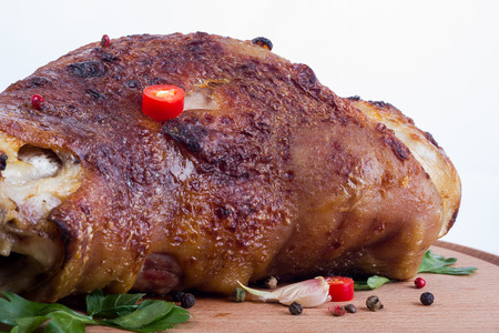 pork knuckle on a white backgroundの写真素材
