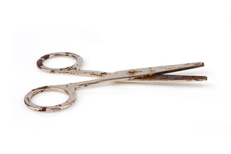 old scissors on a white backgroundの写真素材