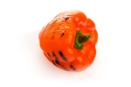 red pepper with the grill stripes on white backgroundの写真素材