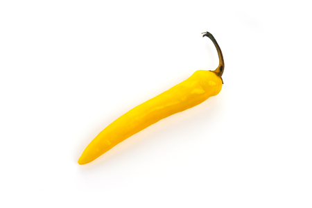 Hot yellow pepper on white backgroundの写真素材