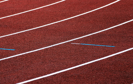 Turn the race an athletics track with red tartan surfaceの写真素材