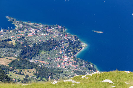 Aerial shot of the city by the lake. Lago di Garda, Malcesineの写真素材