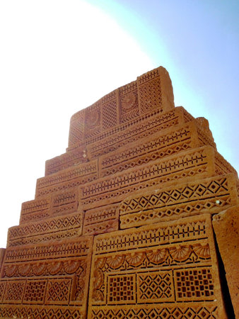Ornamental designed clay structure at an old cemetery 