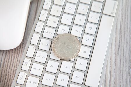 Bitcoin king of crypto currency on a computer background, Gold, Bronze and Silverの写真素材