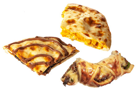 Three different flavoured stuff naan breads isolated on white backgroundの写真素材