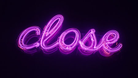 Neon sign of love in the form of letters on a black backgroundの素材