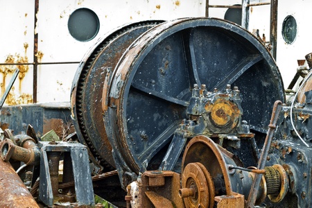 Large metal gears on an industrial tugboat in the ship harbor.の写真素材