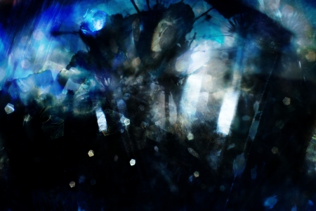 Mysterious dark abstract with light and shadows in blue.の写真素材