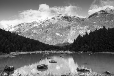 Chilkoot River near Haines Alaska in fall in  black and white.の写真素材
