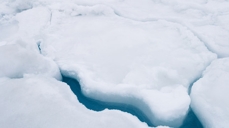 Crack in ice on sea ice in Alaska in winter.の写真素材