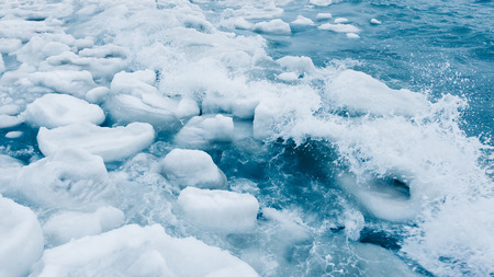 Ice bergs floating on a frozen ocean in Alaska.の写真素材