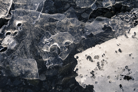 Broken sea ice melting on an Alaskan beach.の写真素材