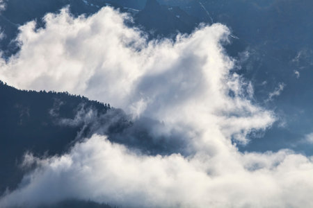 Dramatic clouds after a storm in Southeast Alaskan mountains.