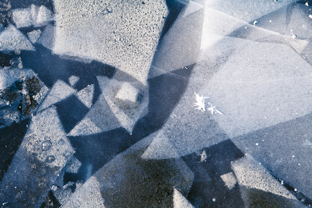 Shards of ice form an artistic abstract.の写真素材