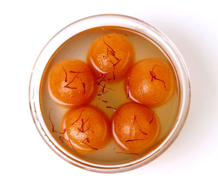 Gulab Jamun is a milk-solid-based Indian sweet made for festival or wedding party