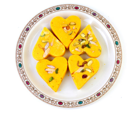 Indian delicious sweets and Mithai on a plate for festivalの写真素材