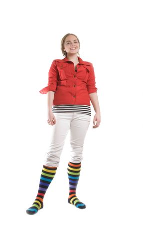laughing girl in striped multicolored long kneeの写真素材