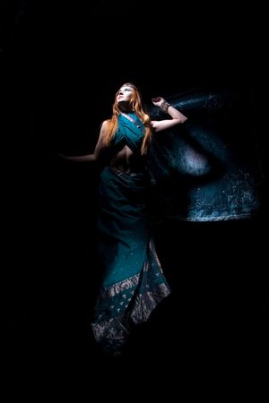 creative dynamic studio  portrait in turkise green sarryの写真素材