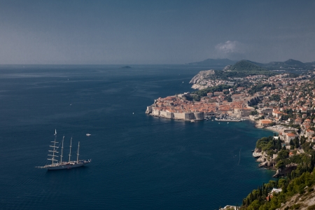 Panorama of UNESCO old town of Dubrovnik. With a bark on the seaの写真素材