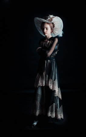 In style end of the XIX begining of the XX century - dress belongs to her great-great grand mother...