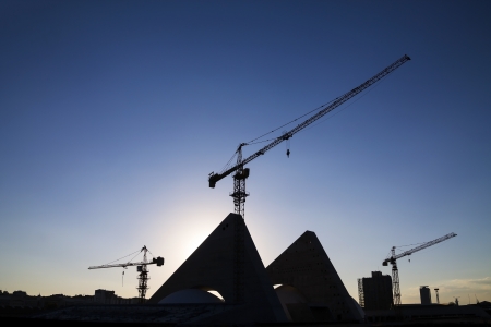 Construction crane, silhouettesの写真素材