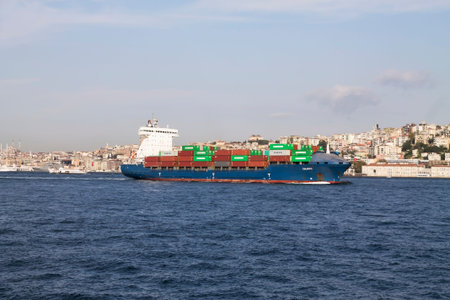 ISTANBUL - AUG 31: Container ship, Calisto passing through Bosphorus on August 31, 2013 in Istanbul,...